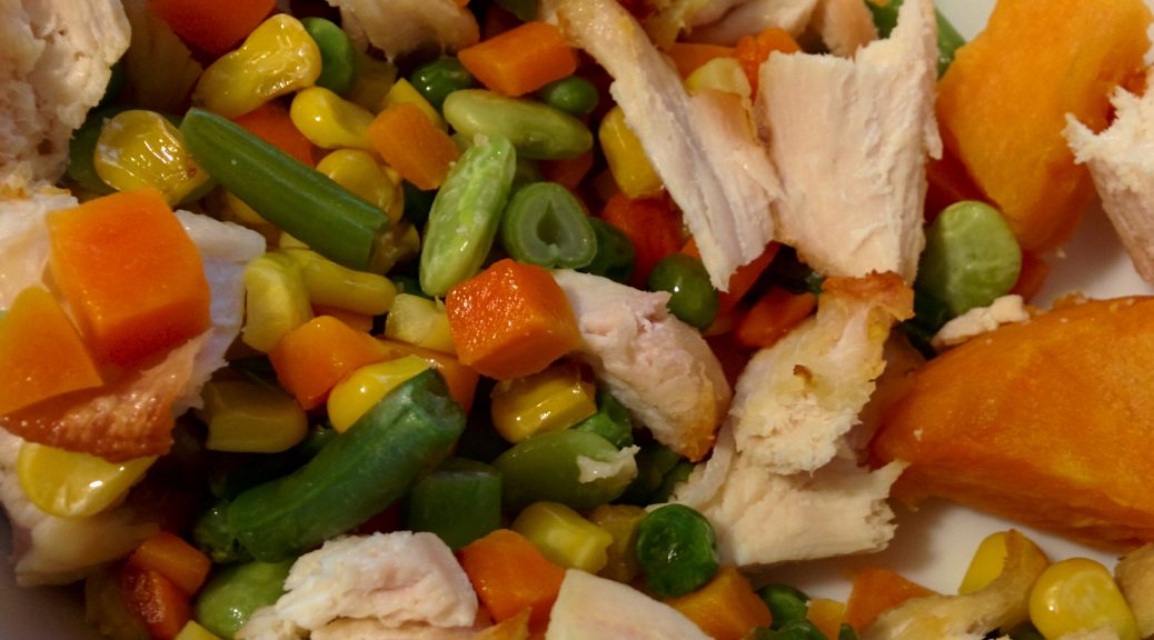 Mixture of corn, peas, carrots, sweet potatoes and chicken.